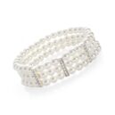 Three row silver colour crystal and white pearl effect elasticated bracelet