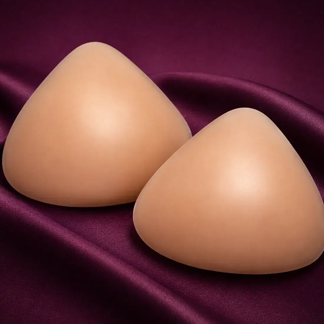 Triangular breast forms from the Translife range showing their broad triangular shape